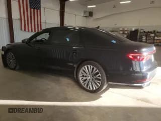 ✅ 2019 Audi A8 • VIN: WAU8DAF88KN003337 • Лот: 40893973. Опубликован ранее на Copart с пробегом 55 908 миль. Бесплатный доступ к архиву аукционных продаж из США и подробный отчёт об истории автомобиля на DreamBid. Изображение 2.
