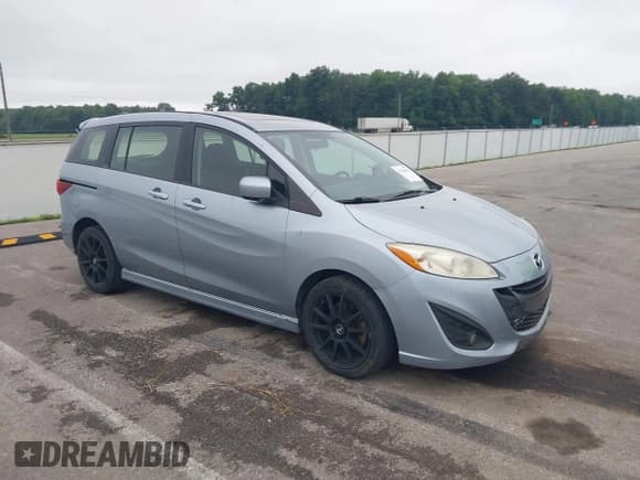 ✅ 2012 Mazda 5 Touring • VIN: JM1CW2CL7C0115096 • Lot: 42524956. Wystawiony na IAAI z przebiegiem 173 155 mil. Bezpłatny archiwum sprzedaży aukcyjnych z USA i szczegółowy raport historii pojazdu na DreamBid. Zdjęcie 1.