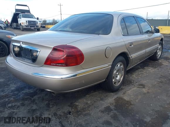 ✅ 2001 Lincoln Continental • VIN: 1LNHM97V31Y736149 • Lot: 43634063. Listed on IAAI with 139,346 mi. Free auction sales archive from the USA and detailed vehicle history report at DreamBid. Image 4.