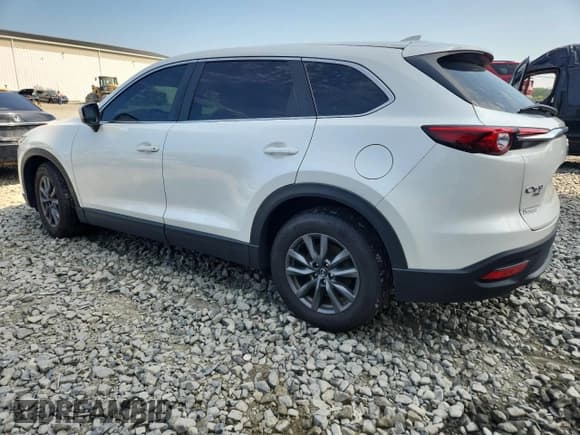 ✅ 2022 Mazda CX-9 Sport • VIN: JM3TCBBY9N0606317 • Лот: 66831945. Опубликован ранее на Copart с пробегом 60 011 миль. Бесплатный доступ к архиву аукционных продаж из США и подробный отчёт об истории автомобиля на DreamBid. Изображение 2.