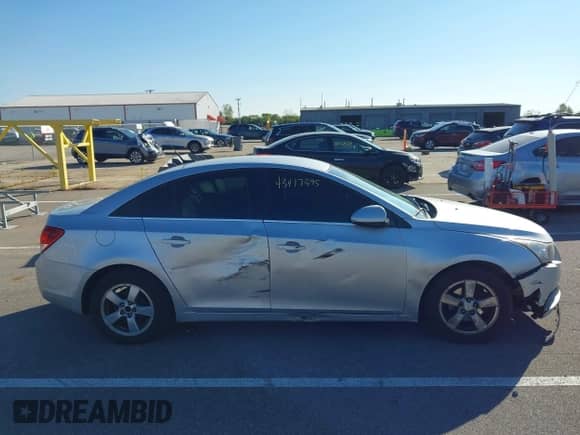 2014 Chevrolet Cruze 1LT с VIN 1G1PC5SB2E7258013, выставлен на аукционе IAAI как лот 43417395 с пробегом 219 609 миль миль и . История ставок и продаж доступна на DreamBid. Изображение 13.