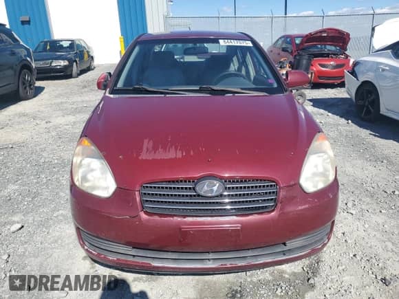 2006 Hyundai Accent GL z VIN KMHCN45C26U052459, wystawiony jako Copart lot #84417075 z przebiegiem 247 312 mil mil oraz Szkoda całkowita • Salvage title. Historia ofert i sprzedaży dostępna na DreamBid. Obrazek 5.