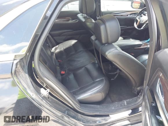 ✅ 2013 Cadillac XTS Luxury • VIN: 2G61P5S39D9105431 • Lot: 42827042. Wystawiony na IAAI z przebiegiem 87 048 mil. Bezpłatny archiwum sprzedaży aukcyjnych z USA i szczegółowy raport historii pojazdu na DreamBid. Zdjęcie 8.