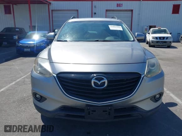 ✅ 2014 Mazda CX-9 Touring • VIN: JM3TB2CV1E0426577 • Lot: 43061325. Listed on IAAI with 109,625 mi. Free auction sales archive from the USA and detailed vehicle history report at DreamBid. Image 12.