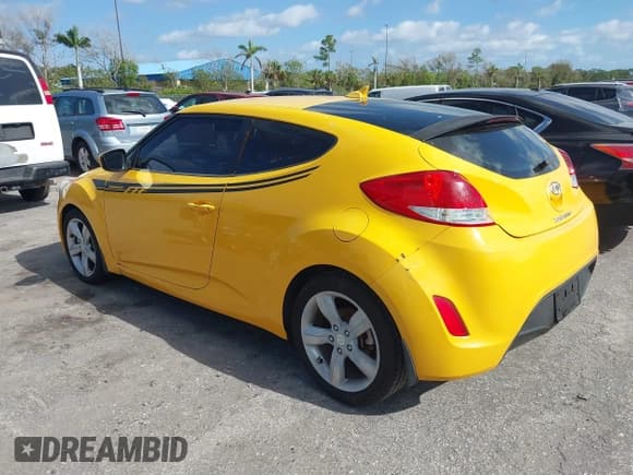 ✅ 2013 Hyundai Veloster w/Black Int • VIN: KMHTC6AD8DU134970 • Lot: 41269412. Wystawiony na IAAI z przebiegiem 131 910 mil. Bezpłatny archiwum sprzedaży aukcyjnych z USA i szczegółowy raport historii pojazdu na DreamBid. Zdjęcie 3.