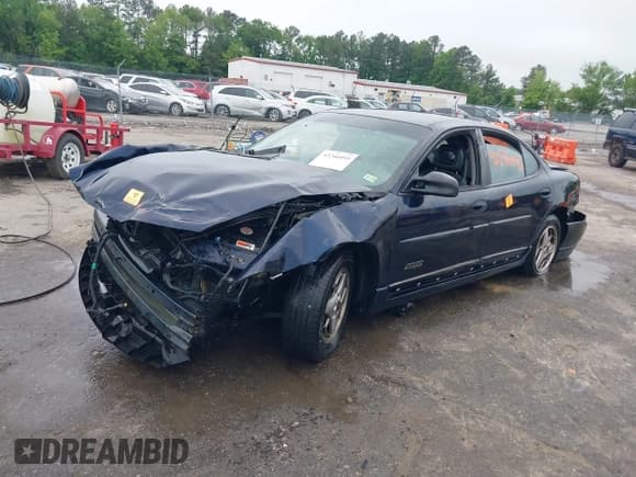 ✅ 2002 Pontiac Grand Prix GTP • VIN: 1G2WR521X2F185570 • Lot: 42246095. Wystawiony na IAAI z przebiegiem 235 457 mil. Bezpłatny archiwum sprzedaży aukcyjnych z USA i szczegółowy raport historii pojazdu na DreamBid. Zdjęcie 16.