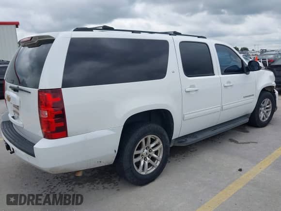 2014 Chevrolet Suburban LT z VIN 1GNSCJE02ER153469, wystawiony jako IAAI lot #42481563 z przebiegiem 249 441 mil mil oraz . Historia ofert i sprzedaży dostępna na DreamBid. Obrazek 4.
