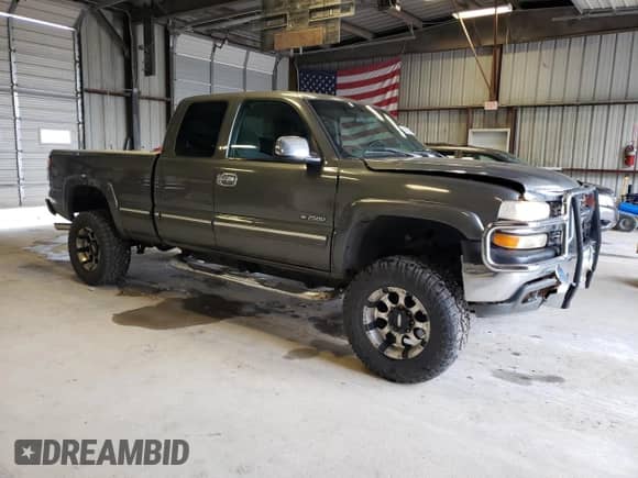 1999 Chevrolet Silverado 2500 LS z VIN 1GCGK29U7XE183016, wystawiony jako Copart lot #54603234 z przebiegiem 198 885 mil mil oraz Szkoda całkowita • Salvage title. Historia ofert i sprzedaży dostępna na DreamBid. Obrazek 4.