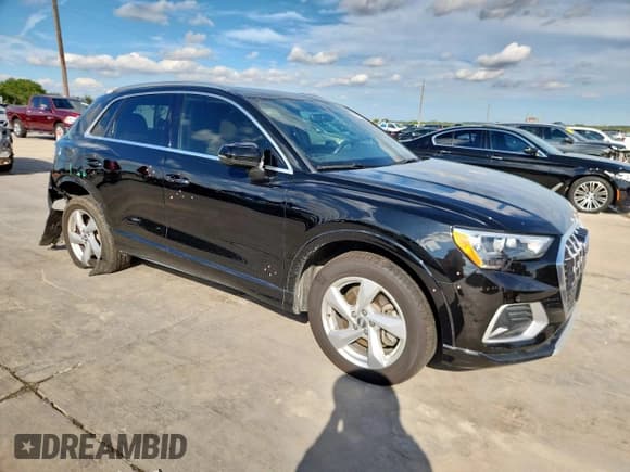 ✅ 2020 Audi Q3 Premium • VIN: WA1AECF35L1122046 • Lot: 83785525. Listed on Copart with 61,170 mi. Free auction sales archive from the USA and detailed vehicle history report at DreamBid. Image 4.