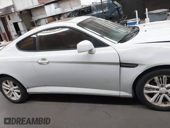 2008 Hyundai Tiburon GS с VIN KMHHM66D98U280005, выставлен на аукционе IAAI как лот 42580014 с пробегом 267 858 миль миль и . История ставок и продаж доступна на DreamBid. Изображение 13.