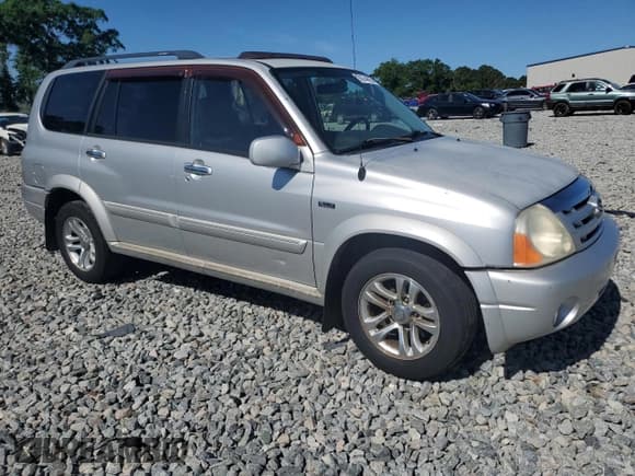 ✅ 2004 Suzuki XL7 LX • VIN: JS3TY92V144105911 • Lot: 56744425. Listed on Copart with 253,975 mi. Free auction sales archive from the USA and detailed vehicle history report at DreamBid. Image 4.