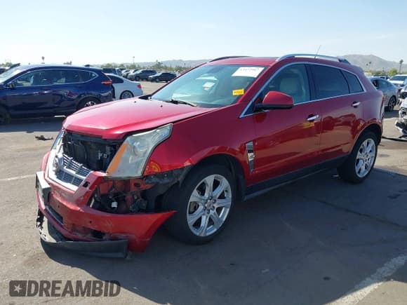 ✅ 2011 Cadillac SRX Performance Collection • VIN: 3GYFNEEY1BS617386 • Lot: 42472967. Listed on IAAI with 145,476 mi. Free auction sales archive from the USA and detailed vehicle history report at DreamBid. Image 17.