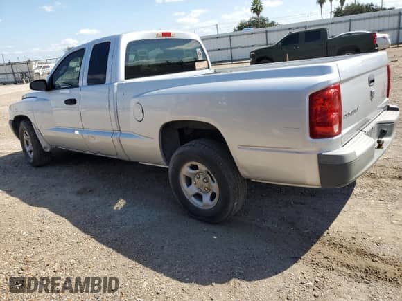 2005 Dodge Dakota ST с VIN 1D7HE22K55S217673, выставлен на аукционе Copart как лот 75668744 с пробегом 142 379 миль миль и Списание • Salvage title. История ставок и продаж доступна на DreamBid. Изображение 2.