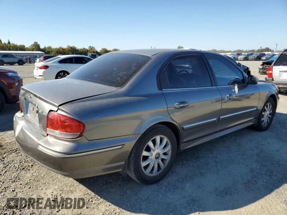 ✅ 2004 Hyundai Sonata GLS • VIN: KMHWF35H34A065347 • Лот: 82628875. Опубликован ранее на Copart с пробегом 117 726 миль. Бесплатный доступ к архиву аукционных продаж из США и подробный отчёт об истории автомобиля на DreamBid. Изображение 3.