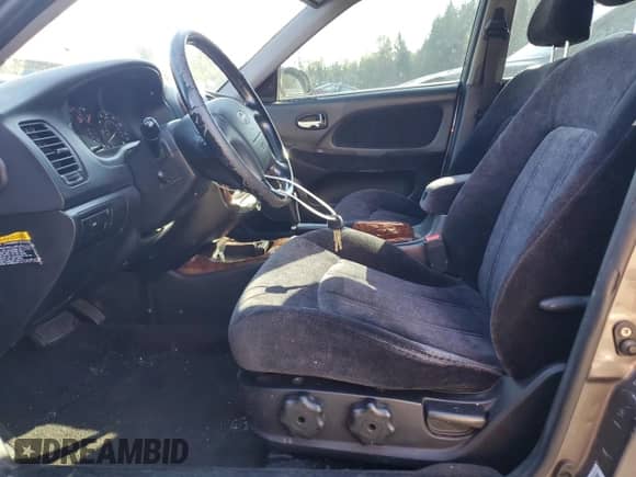 2002 Hyundai Sonata GLS with VIN KMHWF35H42A692541, listed as a Copart auction lot 75359064 with 134,347 mi miles and Salvage title. Bid and sale history available at DreamBid. Image 7.