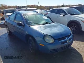 ✅ 2003 Dodge Neon SE • VIN: 1B3ES26C83D230011 • Lot: 43720985. Listed on IAAI with 263,182 mi. Free auction sales archive from the USA and detailed vehicle history report at DreamBid. Image 1.