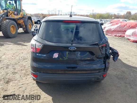 ✅ 2017 Ford Escape S • VIN: 1FMCU0F7XHUA26384 • Lot: 43631016. Listed on IAAI with 69,188 mi. Free auction sales archive from the USA and detailed vehicle history report at DreamBid. Image 16.