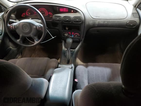 ✅ 2002 Pontiac Grand Prix GT • VIN: 1G2WP12K52F262028 • Лот: 70868895. Опубликован ранее на Copart с пробегом 323 648 миль. Бесплатный доступ к архиву аукционных продаж из США и подробный отчёт об истории автомобиля на DreamBid. Изображение 8.