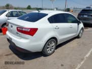 ✅ 2013 Kia Rio EX • VIN: KNADN4A38D6117229 • Lot: 42519647. Listed on IAAI with 118,539 mi. Free auction sales archive from the USA and detailed vehicle history report at DreamBid. Image 4.