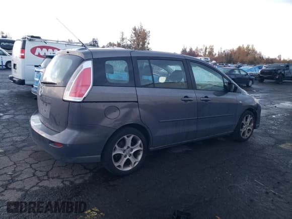 ✅ 2009 Mazda 5 Grand Touring • VIN: JM1CR29L990334004 • Lot: 91888835. Listed on Copart with 196,083 mi. Free auction sales archive from the USA and detailed vehicle history report at DreamBid. Image 3.