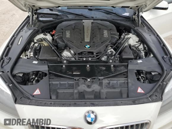 ✅ 2013 BMW 6 Series 650i • VIN: WBAYP9C55DDW21420 • Lot: 73141424. Wystawiony na Copart z przebiegiem 33 338 mil. Bezpłatny archiwum sprzedaży aukcyjnych z USA i szczegółowy raport historii pojazdu na DreamBid. Zdjęcie 11.