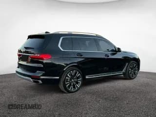 ✅ 2019 BMW X7 xDrive50i • VIN: 5UXCX4C58KLS38928 • Лот: 93027945. Опубликован ранее на Copart с пробегом 98 606 миль. Бесплатный доступ к архиву аукционных продаж из США и подробный отчёт об истории автомобиля на DreamBid. Изображение 4.