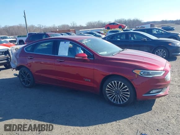 ✅ 2018 Ford Fusion Titanium • VIN: 3FA6P0SU3JR106441 • Lot: 41699936. Listed on IAAI with 146,330 mi. Free auction sales archive from the USA and detailed vehicle history report at DreamBid. Image 13.