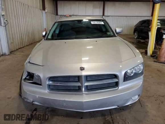 2010 Dodge Charger SXT с VIN 2B3CA3CV4AH231131, выставлен на аукционе Copart как лот 74116564 с пробегом Не указан миль и Списание • Salvage title. История ставок и продаж доступна на DreamBid. Изображение 5.
