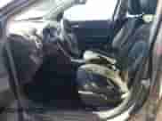 2013 Chevrolet Sonic RS z VIN 1G1JG6SB4D4141677, wystawiony jako Copart lot #63330805 z przebiegiem 119 896 mil mil oraz Szkoda całkowita • Salvage title. Historia ofert i sprzedaży dostępna na DreamBid. Obrazek 7.