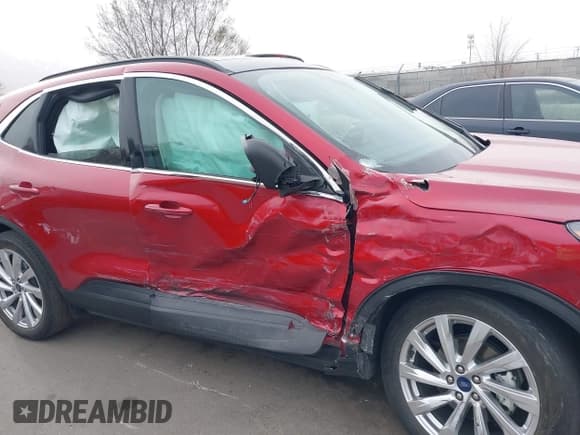 ✅ 2021 Ford Escape Titanium Hybrid • VIN: 1FMCU9DZ1MUA01599 • Lot: 41912441. Listed on IAAI with 20,660 mi. Free auction sales archive from the USA and detailed vehicle history report at DreamBid. Image 6.