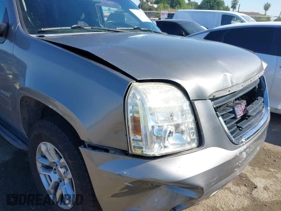 ✅ 2012 GMC Yukon SLE • VIN: 1GKS1AE02CR228574 • Lot: 42068447. Listed on IAAI with 169,918 mi. Free auction sales archive from the USA and detailed vehicle history report at DreamBid. Image 19.