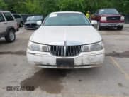 ✅ 1998 Lincoln Town Car Signature • VIN: 1LNFM82W5WY678263 • Lot: 42884109. Listed on IAAI with 128,024 mi. Free auction sales archive from the USA and detailed vehicle history report at DreamBid. Image 13.