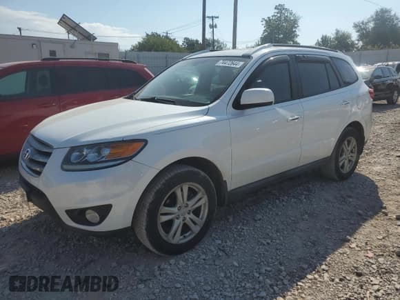 ✅ 2012 Hyundai Santa Fe Limited • VIN: 5XYZK4AG4CG136330 • Lot: 74472644. Listed on Copart with 99,014 mi. Free auction sales archive from the USA and detailed vehicle history report at DreamBid. Image 1.