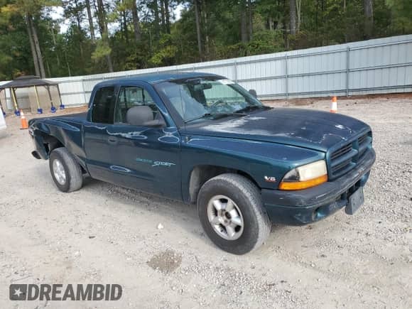 1998 Dodge Dakota SLT with VIN 1B7GL22X0WS571187, listed as a Copart auction lot 81722905 with 129,295 mi miles and Salvage title. Bid and sale history available at DreamBid. Image 4.