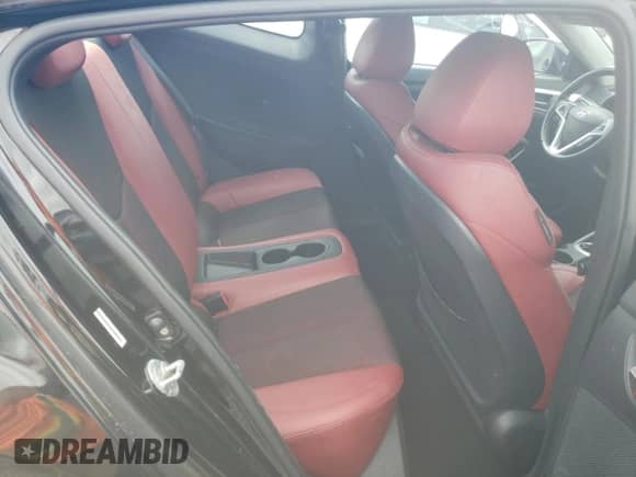 2012 Hyundai Veloster w/Red Int z VIN KMHTC6AD6CU026250, wystawiony jako Copart lot #73139464 z przebiegiem 215 374 mil mil oraz Czysty tytuł • Clean title. Historia ofert i sprzedaży dostępna na DreamBid. Obrazek 10.