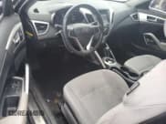 ✅ 2013 Hyundai Veloster w/Black Int • VIN: KMHTC6AD6DU087342 • Lot: 87000014. Listed on Copart with 121,700 mi. Free auction sales archive from the USA and detailed vehicle history report at DreamBid. Image 8.