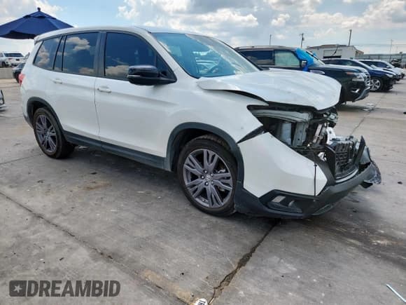 ✅ 2021 Honda Passport EX-L • VIN: 5FNYF7H57MB002751 • Lot: 69928005. Listed on Copart with 47,448 mi. Free auction sales archive from the USA and detailed vehicle history report at DreamBid. Image 4.