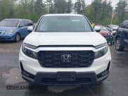 ✅ 2023 Honda Passport EX-L • VIN: 5FNYF8H5XPB005136 • Lot: 42275156. Listed on IAAI with 35,471 mi. Free auction sales archive from the USA and detailed vehicle history report at DreamBid. Image 12.