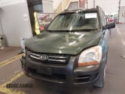 ✅ 2006 Kia Sportage LX • VIN: KNDJE724967292584 • Lot: 40690832. Listed on IAAI with 243,128 mi. Free auction sales archive from the USA and detailed vehicle history report at DreamBid. Image 12.