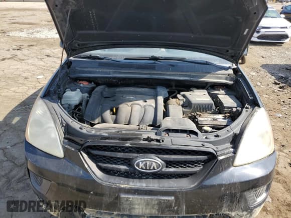 ✅ 2007 Kia Rondo LX • VIN: KNAFG525477121785 • Лот: 80999385. Опубликован ранее на Copart с пробегом 271 516 миль. Бесплатный доступ к архиву аукционных продаж из США и подробный отчёт об истории автомобиля на DreamBid. Изображение 11.