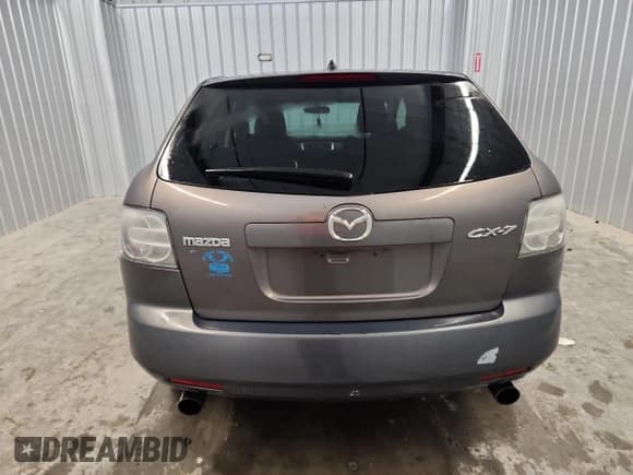 ✅ 2009 Mazda CX-7 Sport • VIN: JM3ER293790237898 • Лот: 90686495. Опубликован ранее на Copart с пробегом 188 058 миль. Бесплатный доступ к архиву аукционных продаж из США и подробный отчёт об истории автомобиля на DreamBid. Изображение 6.