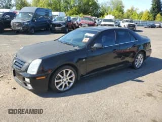 ✅ 2006 Cadillac STS • VIN: 1G6DW677860132053 • Lot: 69755655. Listed on Copart with 223,654 mi. Free auction sales archive from the USA and detailed vehicle history report at DreamBid. Image 1.