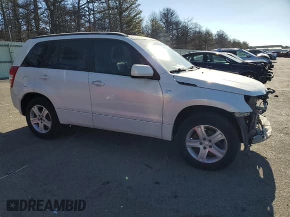 ✅ 2006 Suzuki Grand Vitara Luxury • VIN: JS3TE947X64104637 • Lot: 87182344. Listed on Copart with 83,923 mi. Free auction sales archive from the USA and detailed vehicle history report at DreamBid. Image 4.
