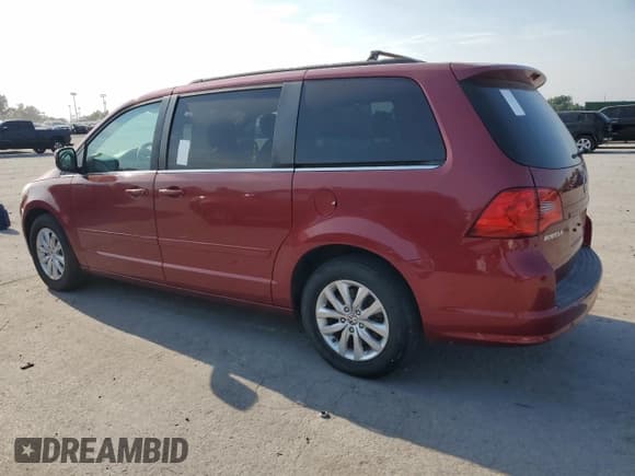 ✅ 2014 Volkswagen Routan SE • VIN: 2C4RVABG9ER134740 • Lot: 80742065. Listed on Copart with 152,602 mi. Free auction sales archive from the USA and detailed vehicle history report at DreamBid. Image 2.