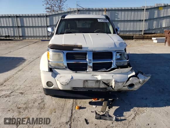 2007 Dodge Nitro SXT с VIN 1D8GU28K37W729848, выставлен на аукционе Copart как лот 77415264 с пробегом 247 756 миль миль и Списание • Salvage title. История ставок и продаж доступна на DreamBid. Изображение 5.