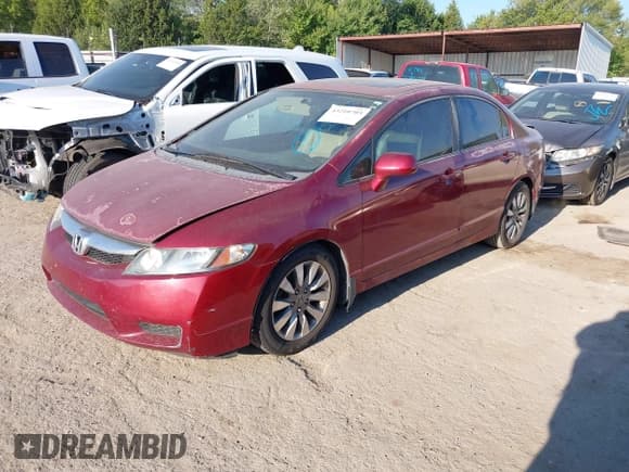 ✅ 2010 Honda Civic EX-L • VIN: 2HGFA1F97AH525638 • Lot: 43210703. Listed on IAAI with 165,909 mi. Free auction sales archive from the USA and detailed vehicle history report at DreamBid. Image 2.