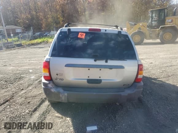 ✅ 2003 Jeep Grand Cherokee Laredo • VIN: 1J4GW48S53C549801 • Lot: 90827805. Listed on Copart with Not provided. Free auction sales archive from the USA and detailed vehicle history report at DreamBid. Image 6.