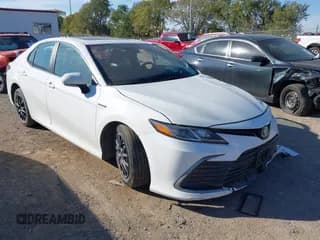 ✅ 2021 Toyota Camry Hybrid LE • VIN: 4T1H31AK3MU566826 • Lot: 43437913. Listed on IAAI with 70,798 mi. Free auction sales archive from the USA and detailed vehicle history report at DreamBid. Image 1.
