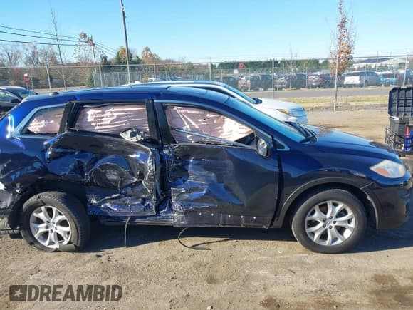 ✅ 2011 Mazda CX-9 Touring • VIN: JM3TB2CA6B0320604 • Lot: 43592863. Listed on IAAI with 214,832 mi. Free auction sales archive from the USA and detailed vehicle history report at DreamBid. Image 14.