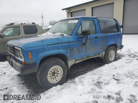 ✅ 1985 Ford Bronco • VIN: 1FMBU14SXFUA96361 • Лот: 43681375. Опубликован ранее на Copart с пробегом 98 999 миль. Бесплатный доступ к архиву аукционных продаж из США и подробный отчёт об истории автомобиля на DreamBid. Изображение 1.